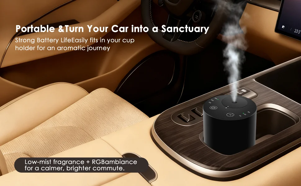 Black portable waterless essential oil diffuser placed in a car cup holder